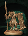 a statue of a knight holding a sword and shield