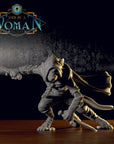 a statue of a woman with a sword on a table
