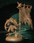 a bronze statue of a demon holding a spear
