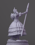 a statue of a woman in a dress holding a sword