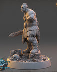 A detailed 3D model of a warrior figure, likely from a fantasy or adventure game, standing on a base and holding a sword.