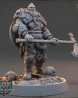 A detailed 3D model of a warrior figure holding a large weapon, standing on a base with a skull and other artifacts.