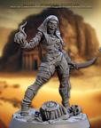 a statue of a woman in a desert setting