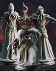 three detailed figurines of fantastical creatures, including tentacles, robes, and other ornate designs. The figurines are arranged in a group, with one on the left, one in the center, and one on the right, all set against a dark, moody background.