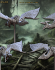 a group of dragon figurines sitting on top of wooden sticks