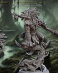 a set of three statues of a creature in a forest