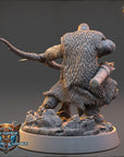 A detailed 3D model of a fantasy character, likely a warrior or knight, standing on a rocky base and holding a weapon. The character has a furry, textured costume and is facing away from the camera.