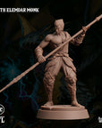 a detailed 3D model of a muscular male character, likely representing the Earth Elemard Monk, holding a spear and standing in a fighting stance.