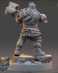 A 3D rendering of a dwarf warrior figure holding a large hammer, standing on a rocky platform.