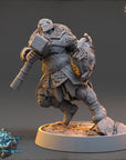 A detailed 3D model of a warrior figure, wearing armor and wielding a sword, standing on a platform.