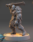 A detailed 3D model of a warrior figure, holding a sword and standing on a platform.