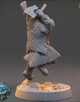 A 3D model of a bearded dwarf warrior figure holding a shield and sword, standing on a platform.