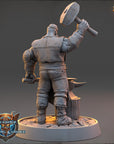 A 3D model of a warrior figure holding a hammer, standing on a base with a shield and other symbols.