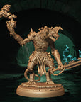 a statue of a demon holding a sword