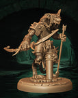 a statue of a demon holding a sword