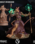 a statue of a wizard holding a green light
