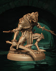 a statue of a skeleton holding a sword
