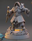 A detailed 3D model of a fantasy character, likely a wizard or magical being, standing on a rocky platform and holding a staff.