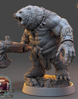 A 3D rendering of a fierce-looking bear figurine, with a large claw-like weapon in its hand. The bear appears to be a warrior or warrior-like creature, and the image is described as a "daybreak miniatures" from the video game "The Wardens of Fear".