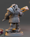 A 3D rendering of a heavily armored and battle-ready dwarf figure, likely from a fantasy or adventure game. The figure is holding a large hammer and appears to be ready for combat or combat training.