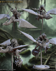 a bunch of different types of dragon figurines