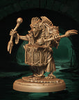 a statue of a man holding a staff