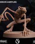 a statue of a demon is shown on a black background