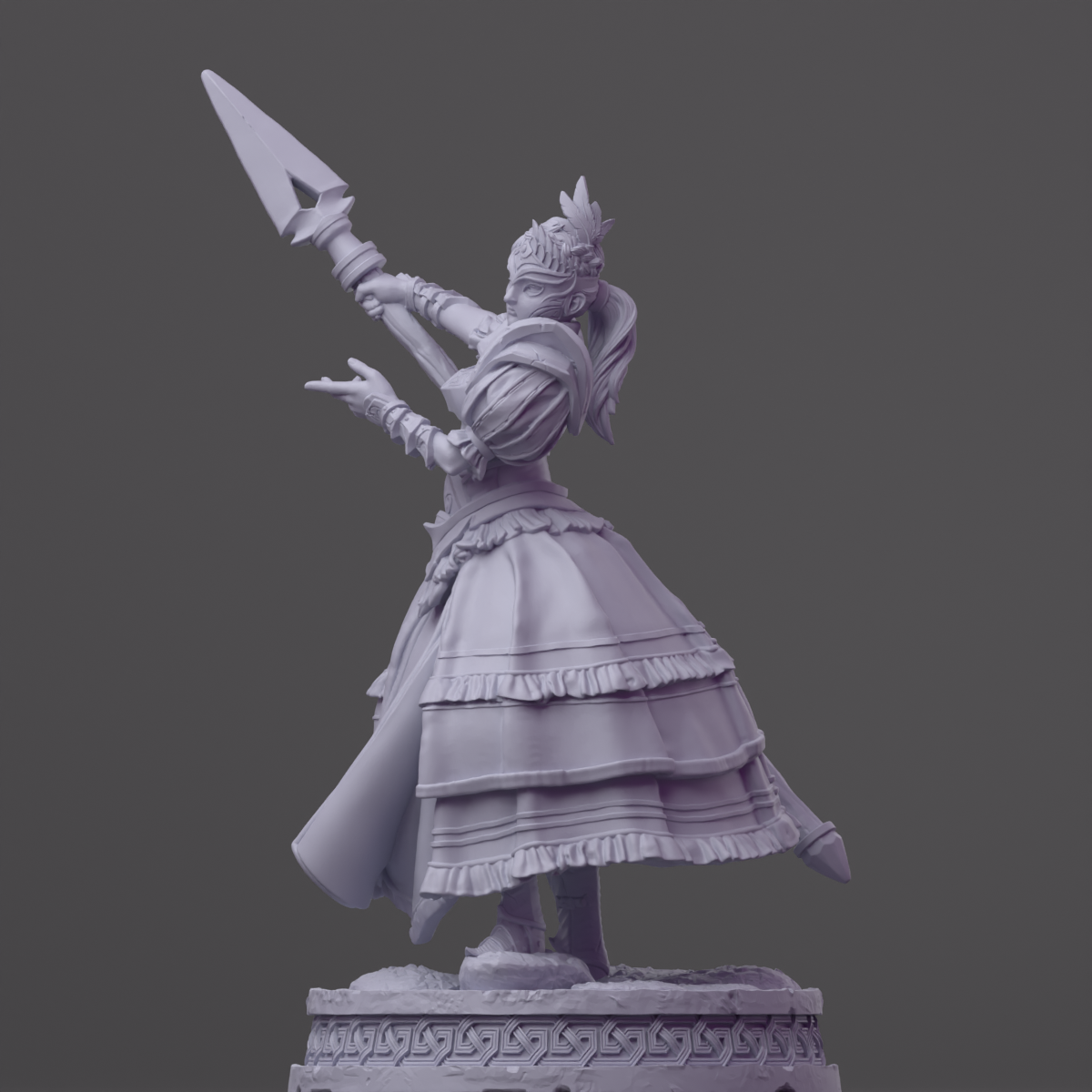 a statue of a woman holding a knife