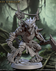 a statue of a demon holding a sword