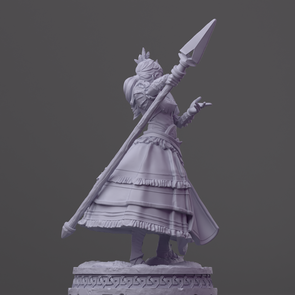 a statue of a woman holding a sword