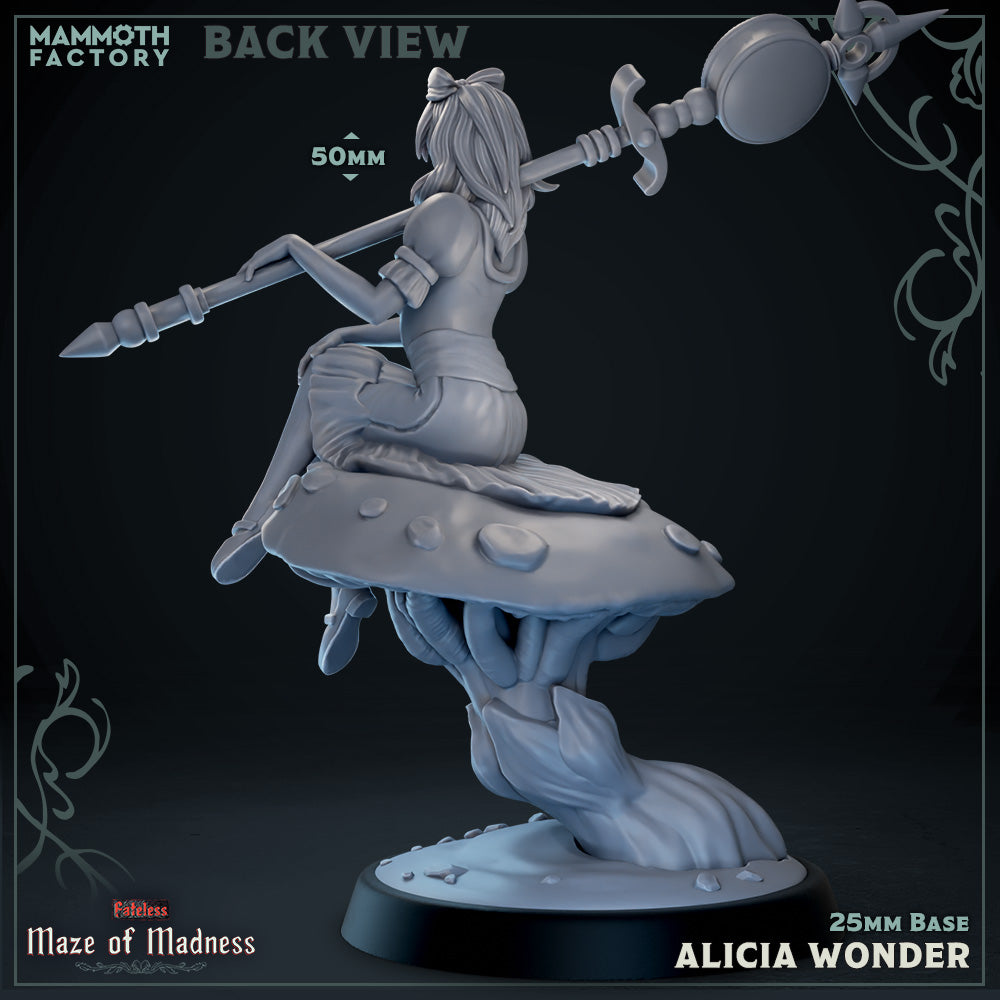 a statue of a woman holding a sword on top of a rock