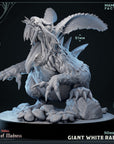 a statue of a giant white rabbit with wings