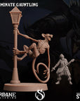 a statue of a rat on a lamp post
