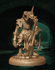 a statue of a creature holding a gun