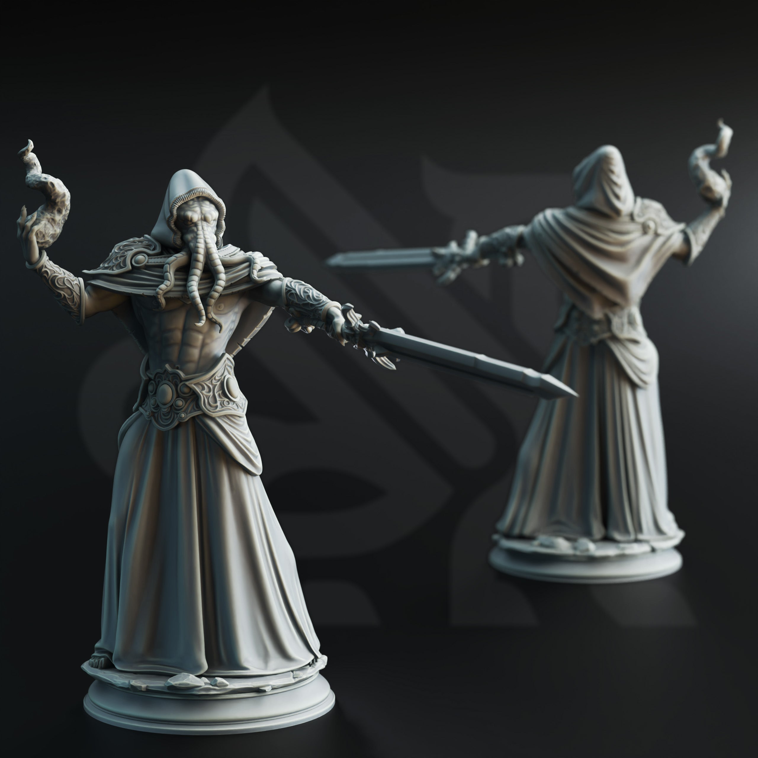 two detailed figurines of medieval-style characters, each holding a sword and wearing ornate robes.